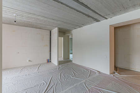 Russia, Moscow- January 27, 2020: interior room apartment rough repair for self-finishing. interior decoration, bare walls of the room, stage of constructionのeditorial素材