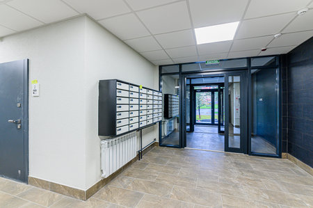 Interior of a corridor with a lot of doors and windows