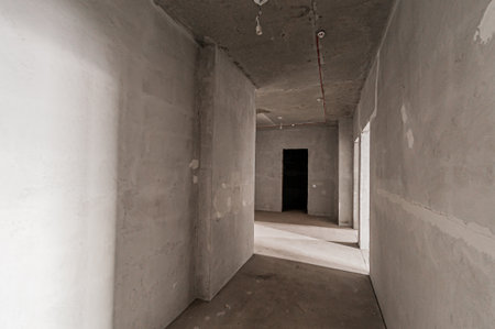 interior of an empty room with concrete walls and concrete floor.の写真素材