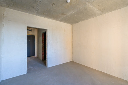 rough repairs for self-finishing. interior decoration, bare walls of the room, stage of construction. interior apartment roomの写真素材