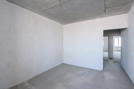 rough repairs for self-finishing. interior decoration, bare walls of the room, stage of construction. interior apartment roomの写真素材