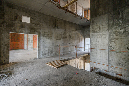 rough repairs for self-finishing. interior decoration, bare walls of the room, stage of...