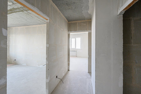 rough repairs for self-finishing. interior decoration, bare walls of the room, stage of construction. interior apartment roomの写真素材