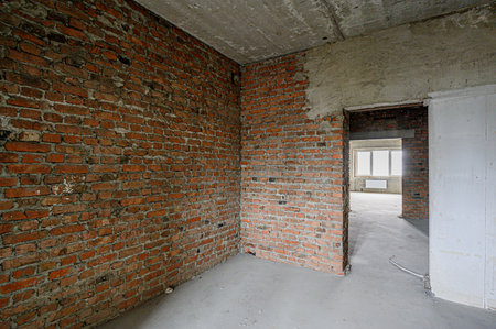 rough repairs for self-finishing. interior decoration, bare walls of the room, stage of construction. interior apartment roomの写真素材