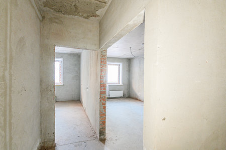 rough repairs for self-finishing. interior decoration, bare walls of the room, stage of construction. interior apartment roomの写真素材
