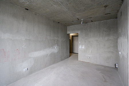 rough repairs for self-finishing. interior decoration, bare walls of the room, stage of construction. interior apartment roomの写真素材