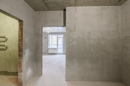 rough repairs for self-finishing. interior decoration, bare walls of the room, stage of construction. interior apartment roomの写真素材