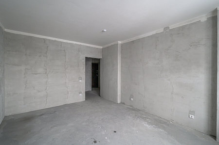 rough repairs for self-finishing. interior decoration, bare walls of the room, stage of construction. interior apartment roomの写真素材