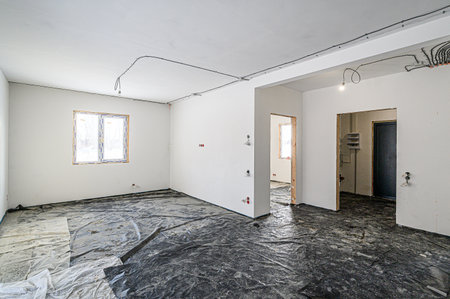 rough repairs for self-finishing. interior decoration, bare walls of the room, stage of construction. interior apartment roomの写真素材