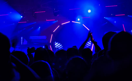 bright laser show in the crowd of merry men