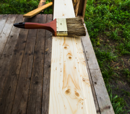 Wood texture and paintbrush / housework backgroundの写真素材