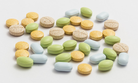 different colored pills in the pack closeupの写真素材