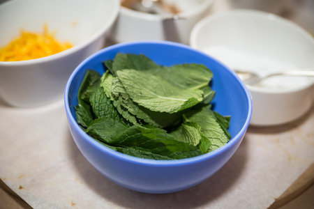 Fresh mint in blue plateの写真素材