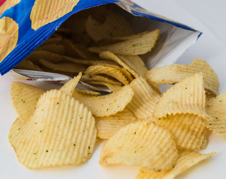 Potato chips bright yellow color is very salty