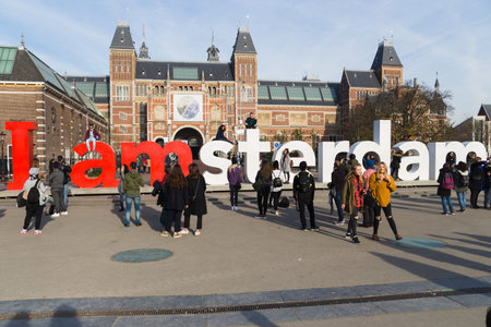 AMSTERDAM - 2 NOVEMBER 2015: The Rijksmuseum Amsterdam museum area with the words IAMSTERDAM is shown in NOVEMBER 2015 in Amsterdam, The Netherlands. The museum first opened to the public in 1800.のeditorial素材