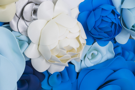 paper flowers for decoration holiday white blue background zoneの写真素材