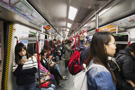 People in Hong Kong travel in metro rush hour, Hong Kong, Hong Kong march 01, 2017のeditorial素材