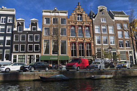 Netherlands, Holland, Amsterdam, November 3, 2015, the way through the Amsterdam channels. Architecture and boats in which people live.のeditorial素材