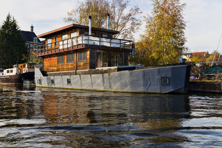 Netherlands, Holland, Amsterdam, November 3, 2015, the way through the Amsterdam channels. Architecture and boats in which people live.の写真素材