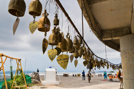 Thailand, Phuket, April 20, 2015, bells to scare away evil spirits and Buddhism in Thailandのeditorial素材