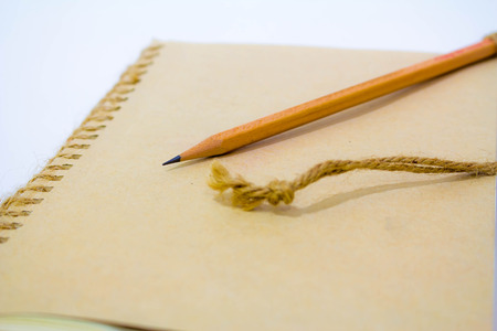 Close up of a pencil and a notebookの写真素材