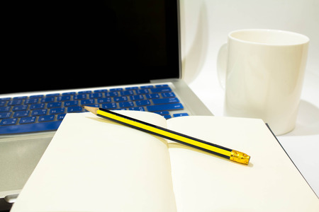 Laptop, notebook and pencil Working place concept .の写真素材