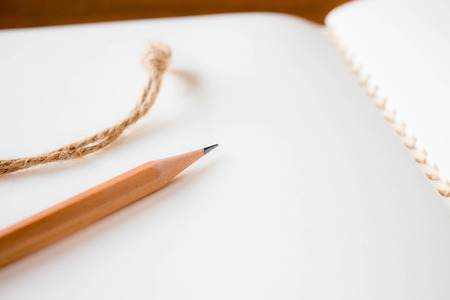 Close up of a pencil and a notebookの写真素材