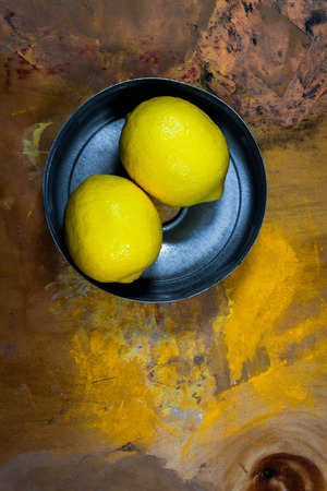 Freshly lemons on rustic boards.の写真素材