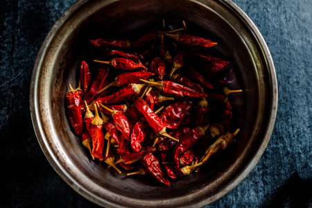 dried red chili pepper spice , closeup.