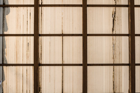 translucent roof tile, Old and dirty plastic fiber roof background abstract.の写真素材