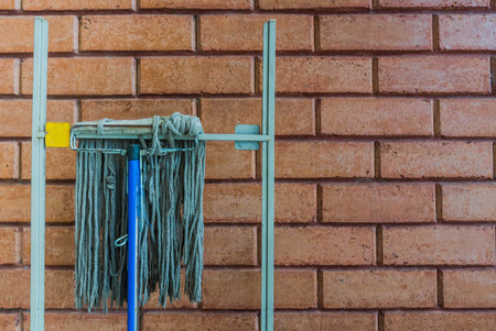 Mop floors and walls, Mop on the walls.の写真素材