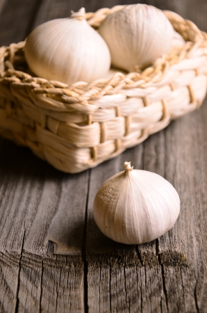 Garlic on gray boardの写真素材