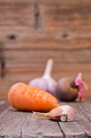 Carrots, beets and garlicの写真素材