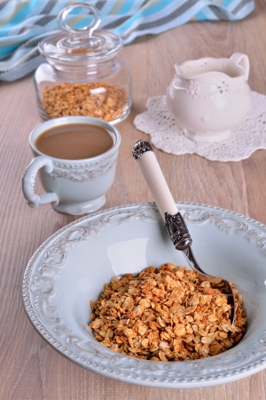 dietary oat granola in a blue plateの写真素材