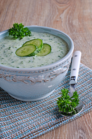Dense cold cucumber soup with dill and yogurtの写真素材