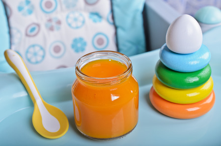 Puree bright orange as food for babiesの写真素材