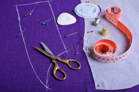 The outline on the fabric purple painted white chalkの写真素材