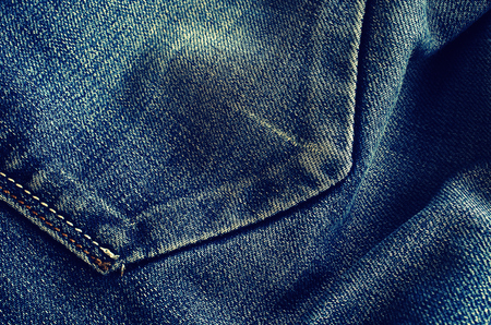 Background of denim blue color with scuffs itemsの写真素材