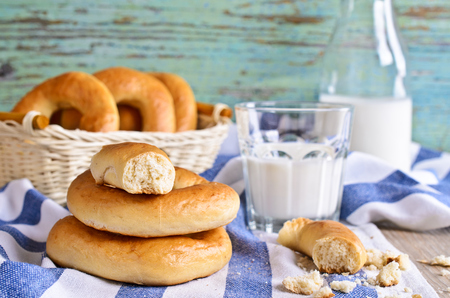 Donut on a napkin with milk in the backgroundの写真素材