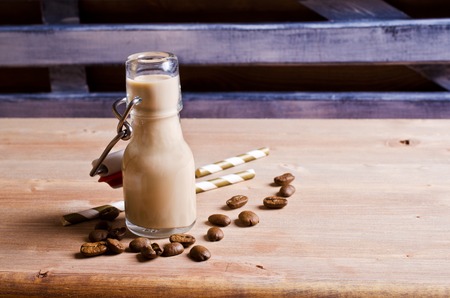 Cocktail of coffee and cream in a glass container. Selective focusの写真素材