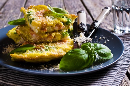 Omelet with shrimp and peas in a rustic style. Selective focus.の写真素材
