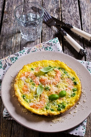 Omelet with shrimp and peas in a rustic style. Selective focus.の写真素材
