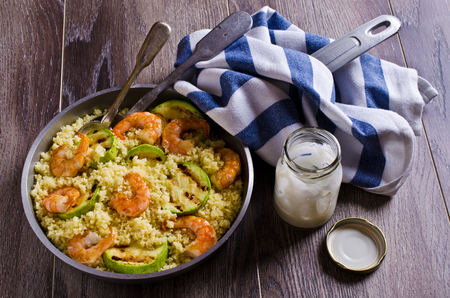 Couscous with grilled vegetables and shrimp. Selective focus.の写真素材