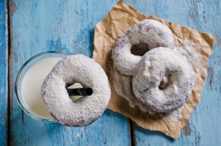 Traditional fried donut in powdered sugar. Selective focus.の写真素材