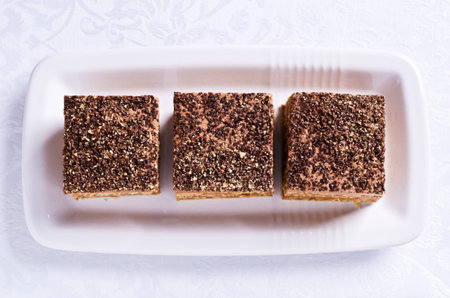 Cake with chocolate cream  and dark biscuit. Selective focus.