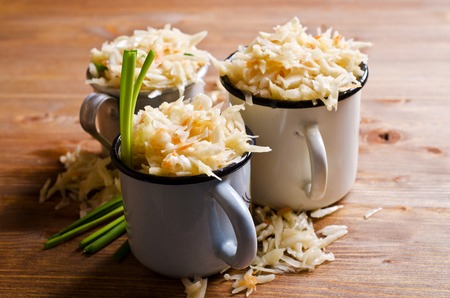 Salad of sauerkraut and carrots in rustic style. Selective focus.の写真素材