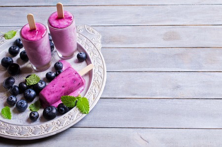 Homemade popsicle blueberry and cream. Selective focus.の写真素材