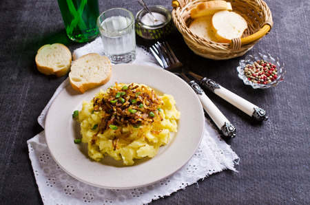 Homemade mashed potatoes with fried onions. Selective focus.の写真素材