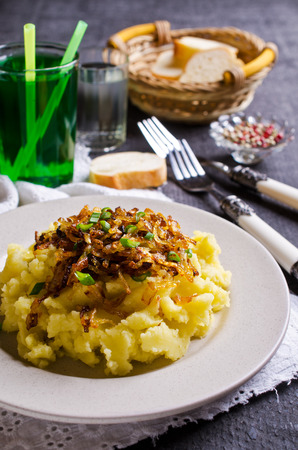 Homemade mashed potatoes with fried onions. Selective focus.の写真素材