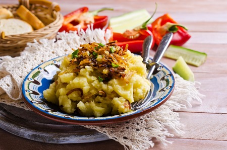 Homemade mashed potatoes with fried onions. Selective focus.の写真素材